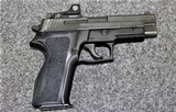 Sig Sauer P 226 Nitron RX in caliber 9mm with optic attached. - 1 of 2