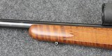 J.G. Anschutz Model 1710 in caliber 22 Long Rifle with a Tiger Stripe stock. - 6 of 8