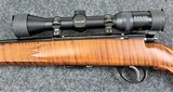 J.G. Anschutz Model 1710 in caliber 22 Long Rifle with a Tiger Stripe stock. - 5 of 8