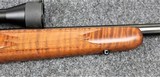 J.G. Anschutz Model 1710 in caliber 22 Long Rifle with a Tiger Stripe stock. - 3 of 8