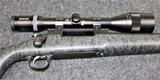 Remington Model 700 in caliber .300 Winchester Magnum with a 26 Inch fluted heavy sniper barrel - 1 of 8