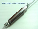 SUPERB 9" ITALIAN MADE SWITCHBLADE AUTOMATIC KNIFE WITH THICK, REAL ZEBRA WOODEN HANDLES, MINT IN THE POUCH WITH 4" BAYONET STYLE RAZOR SHAR - 4 of 5