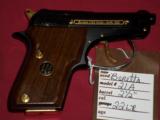 Beretta 21A with gold highlights SOLD - 1 of 7