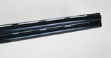 Caesar Guerini Invictus I Sporting M-SPEC, Briley Thin Wall Chokes, Isis Recoil System 12ga 32