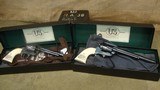 US Fire Arms Mfg Co Commemorative Consecutive Set Olympics 22LR 45 Colt 1873 SAA Pistols; Ivory Grips