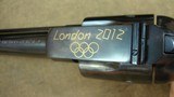 US Fire Arms Mfg Co Commemorative Consecutive Set Olympics 22LR 45 Colt 1873 SAA Pistols; Ivory Grips - 13 of 15