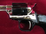 Colt Peacemaker Buntline "2nd Amendment Commemorative"
22LR - 1977 in Presentation Case Beautiful
"Nickel & Blue" - 3 of 9