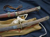 WW2 grouping Arasaka type 38 rifle w/capture papers Japanese swords 2
pictures-patches
and ship box 1943 - 4 of 15