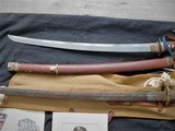 WW2 grouping Arasaka type 38 rifle w/capture papers Japanese swords 2
pictures-patches
and ship box 1943 - 13 of 15