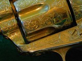 Pair of Colt 1st Gen. Single Actions Gold Finished Engraved Mother of Pearl Grips in 45 Cal. - 14 of 15