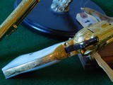 Pair of Colt 1st Gen. Single Actions Gold Finished Engraved Mother of Pearl Grips in 45 Cal. - 11 of 15
