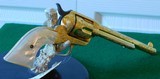 Pair of Colt 1st Gen. Single Actions Gold Finished Engraved Mother of Pearl Grips in 45 Cal. - 10 of 15