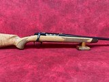 Browning X-Bolt 2 Medallion 300 Win Mag 26" Blue Polished Threaded Barrel, Fixed Gloss AAAA Maple Wood Stock, Radial Muzzle Brake (036080229&