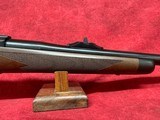 Ruger M77 Hawkeye African 416 Ruger 23" Satin Blued Threaded Barrel, Receiver w/Integral Scope Mount, American Walnut Fixed Stock (37185) - 5 of 12
