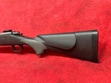 Remington 700 SPS .223 Rem 24" Matte Blue barrel and Black Synthetic stock with gray rubber inserts - Image 8 of 11