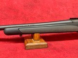 Remington 700 SPS .223 Rem 24" Matte Blue barrel and Black Synthetic stock with gray rubber inserts - Image 10 of 11