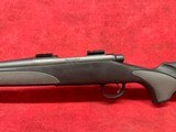 Remington 700 SPS .223 Rem 24" Matte Blue barrel and Black Synthetic stock with gray rubber inserts - Image 9 of 11
