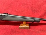 Remington 700 SPS .223 Rem 24" Matte Blue barrel and Black Synthetic stock with gray rubber inserts - Image 4 of 11