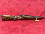 CZ-USA 600 ST2 American High Grade 6.5 Creedmoor 24" Threaded Dark++ Walnut (07717) - Image 1 of 12