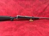 Savage 116 .375 H&H NIB, 24” stainless barrel with open sights - Image 1 of 12