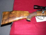 FN MAUSER CUSTOM ACTION FULL OAK LEAF ENGRAVED AND RELIEF ENGRAVED STOCK
- 3 of 4