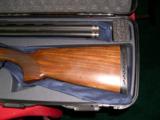 CORTONA SPORT EL 20 GAUGE WITH TUBES AS NEW IN CASE
- 5 of 12