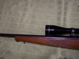 ANSCHUTZ MODEL 1522 WITH LEUPOLD 100 YEAR COMMEMORATIVE 3-9x40 IN 22 MAG - 8 of 8