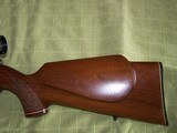ANSCHUTZ MODEL 1522 WITH LEUPOLD 100 YEAR COMMEMORATIVE 3-9x40 IN 22 MAG - 7 of 8