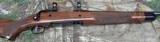 Engraved Savage 110 125th Anniversary Commemorative bolt action rifle in the 250 Savage - 9 of 11