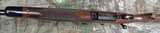 Engraved Savage 110 125th Anniversary Commemorative bolt action rifle in the 250 Savage - 4 of 11
