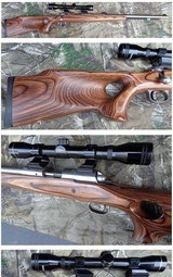 Savage 10ML-II stainless steel muzzleloader with thumbhole laminated stock 50 cal 10 ML 10ML - 1 of 10