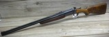 SAVAGE 24 B 22 MAG. OVER 410 GA., WITH SIDE BUTTON BARREL SELECTOR,