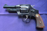 Smith & Wesson triple lock blued 4" barrel revolver - 1 of 15