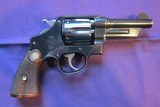 Smith & Wesson triple lock blued 4" barrel revolver - 2 of 15