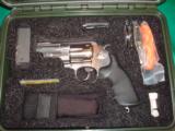 THIS IS THE S&W EMERGENCY TOOL KIT, WITH A 3 INCH M629 AND ALL THE TOOLS NEED TO SURVIVE IN THE WILDERNESS. - 3 of 3