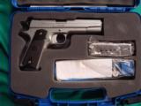 THIS N.I.B. SIG SAUER GRANITE SERIES, STAINLEEE REVOLUTION PISTOL, COMES WITH 2 MAGS. .45 CAL. - 1 of 4