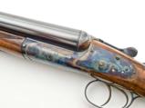 Holland & Holland 'Round Action' Back Action Pre-Owned Sidelock Shotgun - 1 of 3