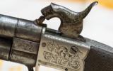 An Engraved H. Holland Rotating Double Barrel Percussion Pocket Pistol at our New York Showroom. Antique - circa 1850 - 4 of 5