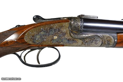 Holland & Holland
*****
PAIR
OF
HOLLAND
RIFLES
*****