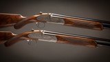 Holland & Holland 12 Gauge Matched Pair Of 'Sporting' Deluxe Model Over-and-Under shotguns with 28 inch barrels.
