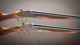 Holland & Holland Matched Pair of Royal Model 12 gauge shotguns located at our Dallas Showrom