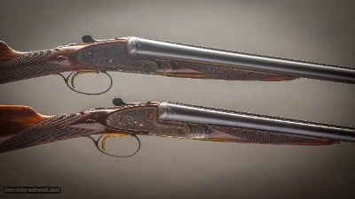 Westley Richards composed pair of 12 gauge & 20 gauge with each gun having two sets of interchangable of barrels