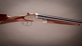 Garbi side by side shotgun with 30 inch barrels and fine Rose & Scroll engraving