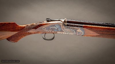 Holland & Holland 12 Gauge 'Sporting ' Model Over-and-Under shotguns with 30 inch barrels.