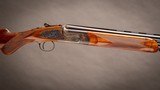 Holland & Holland 12 Gauge 'Sporting' Deluxe Over-and-Under shotgun with 30 inch barrels.