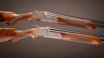 Holland & Holland 12 gauge Pair of
'Sporting Deluxe' Over-and-Under shotguns with 28 inch barrels