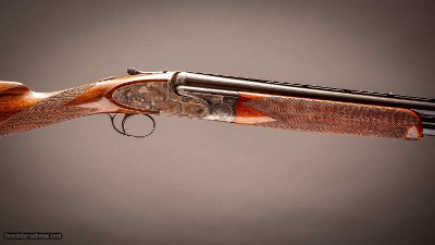 Fabbri over & under 12 gauge with 29 & 29 inch two barrel set gun