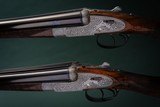 Holland & Holland pair of self opening 'Royal' Model Shotguns with two sets of 28 inch interchangeable barrels for each gun. - 2 of 6