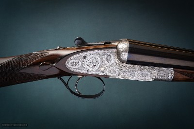 Boss & Co 12 gauge Sidelock Ejector Shotgun with two sets of 28 inch new barrels.
