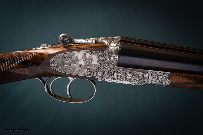 Holland & Holland 'Royal' Deluxe 12 Gauge Sidelock Shotgun with 28 inch barrels.